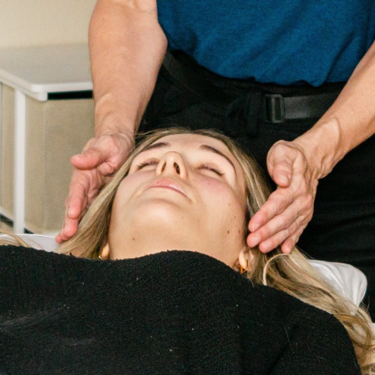 Christy offering a Reiki session